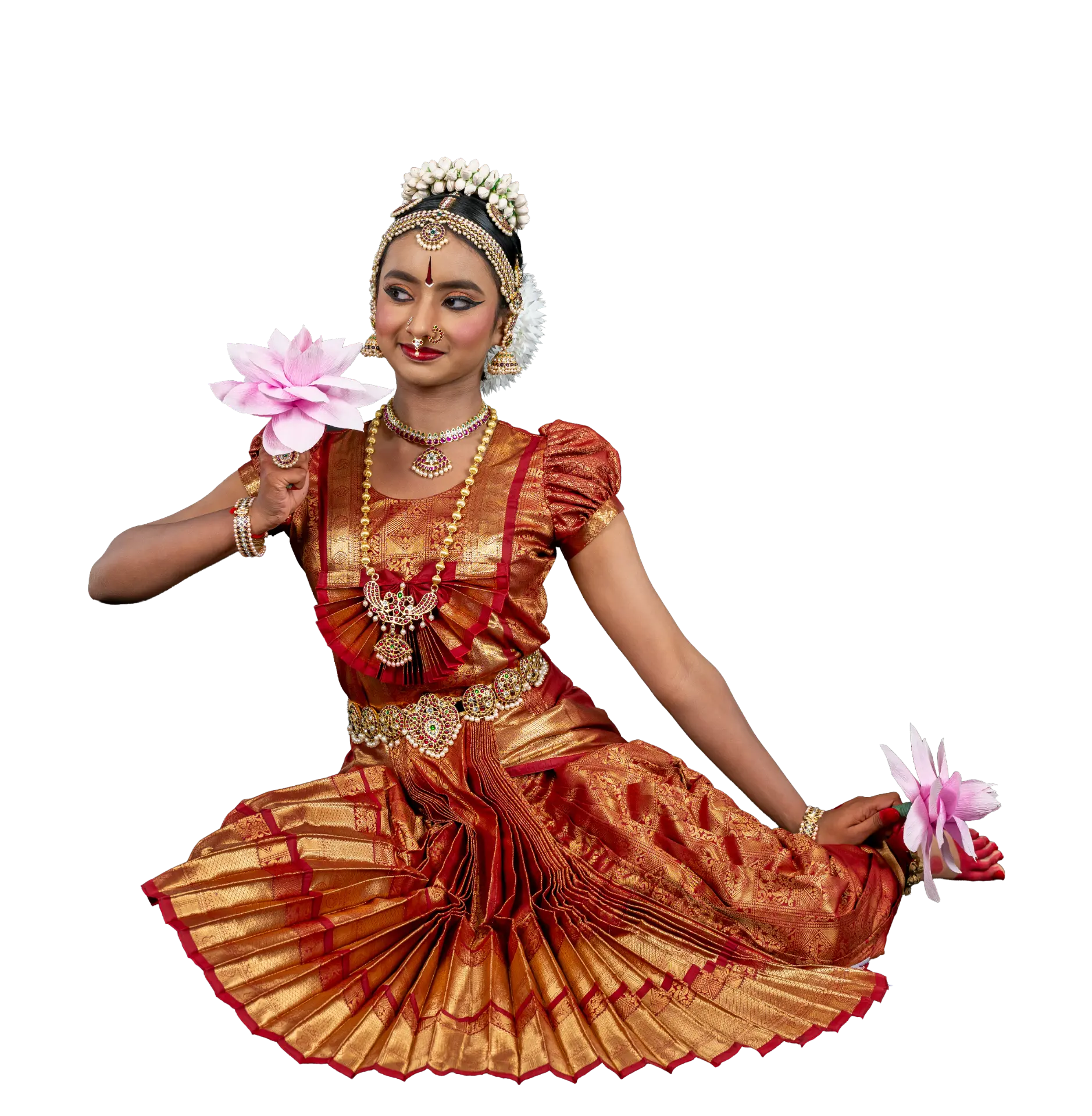 Surabhi seated holding lotus flowers